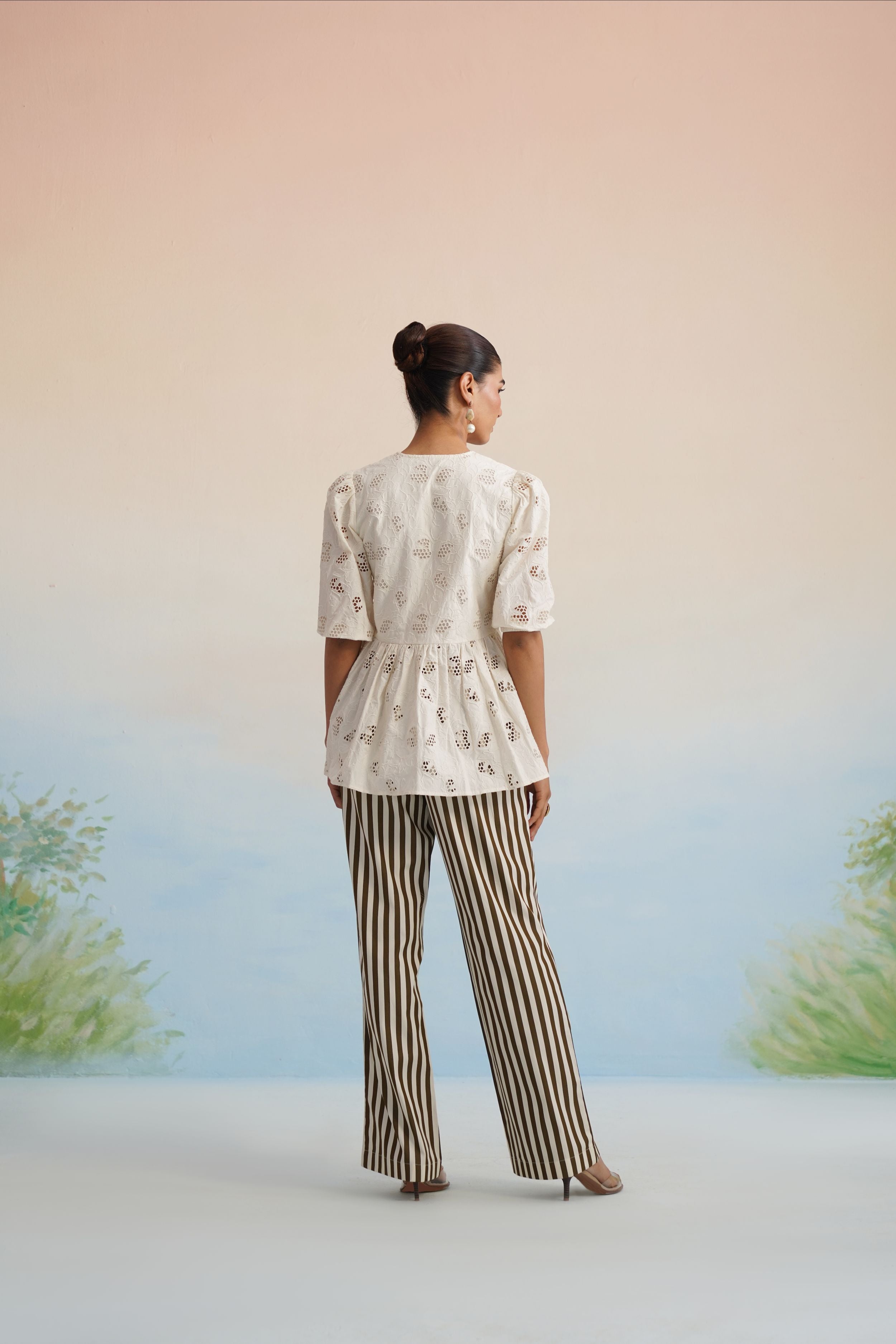 The Alora Broderie Peplum Blouse