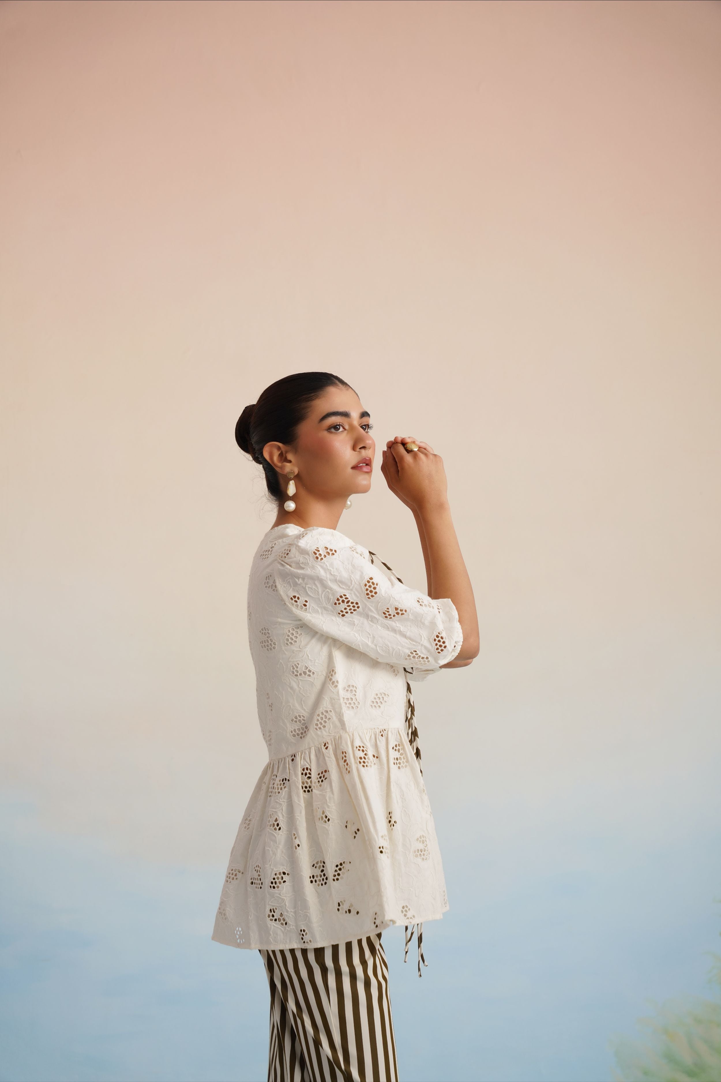 The Alora Broderie Peplum Blouse
