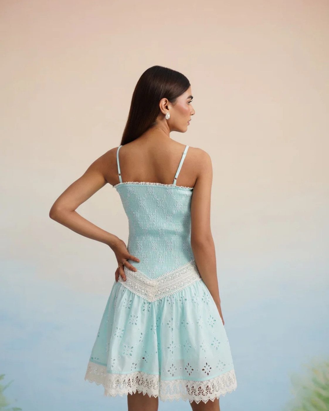 The Aqua Breeze Smocked Eyelet Mini Dress