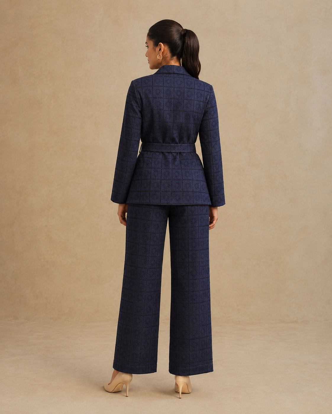 Punany Virmani in The Midnight Navy Eyelet Belted Trouser Suit