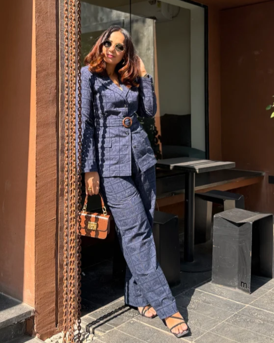 Deepika Kewalraman in The Midnight Navy Eyelet Belted Trouser Suit