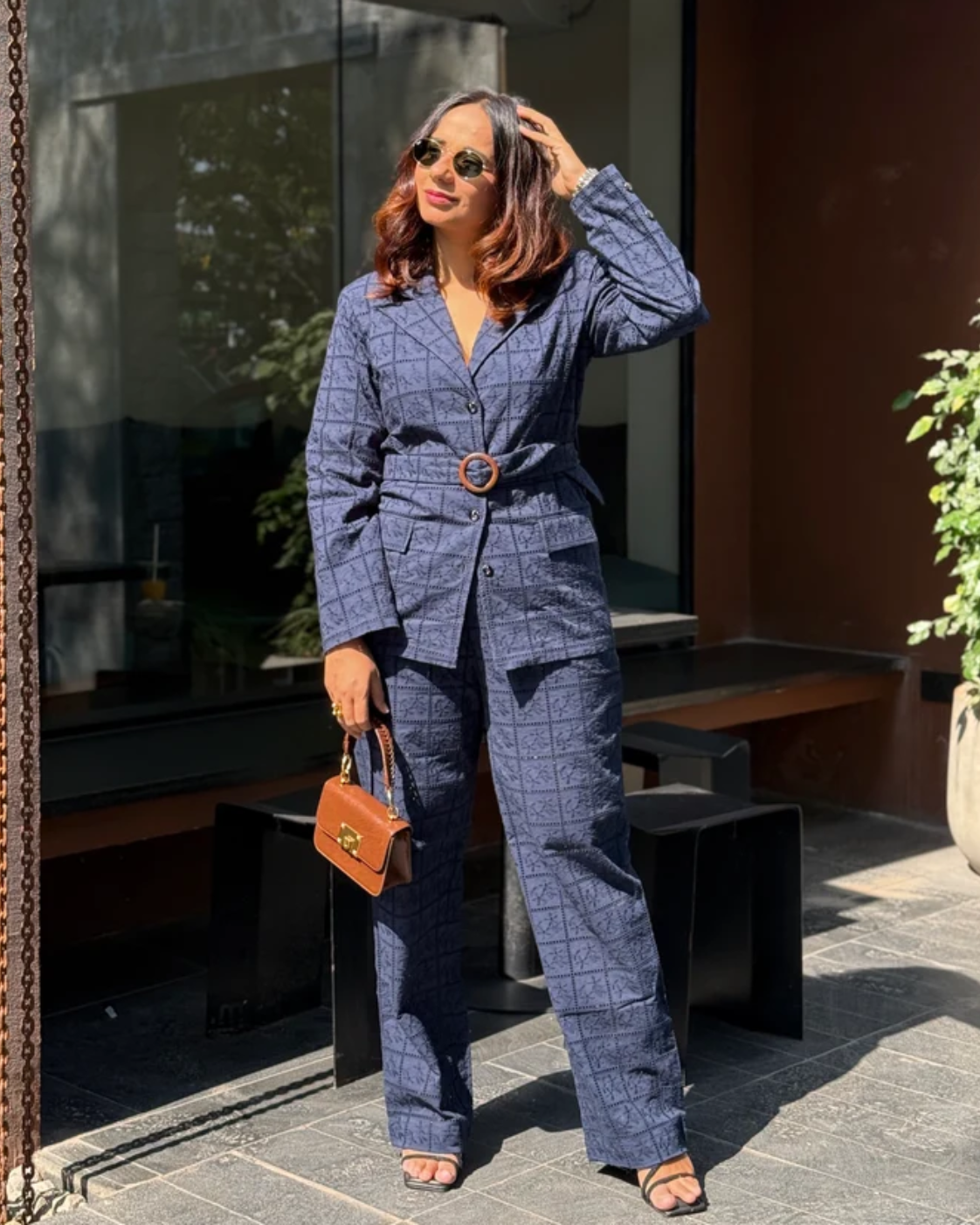 Deepika Kewalraman in The Midnight Navy Eyelet Belted Trouser Suit