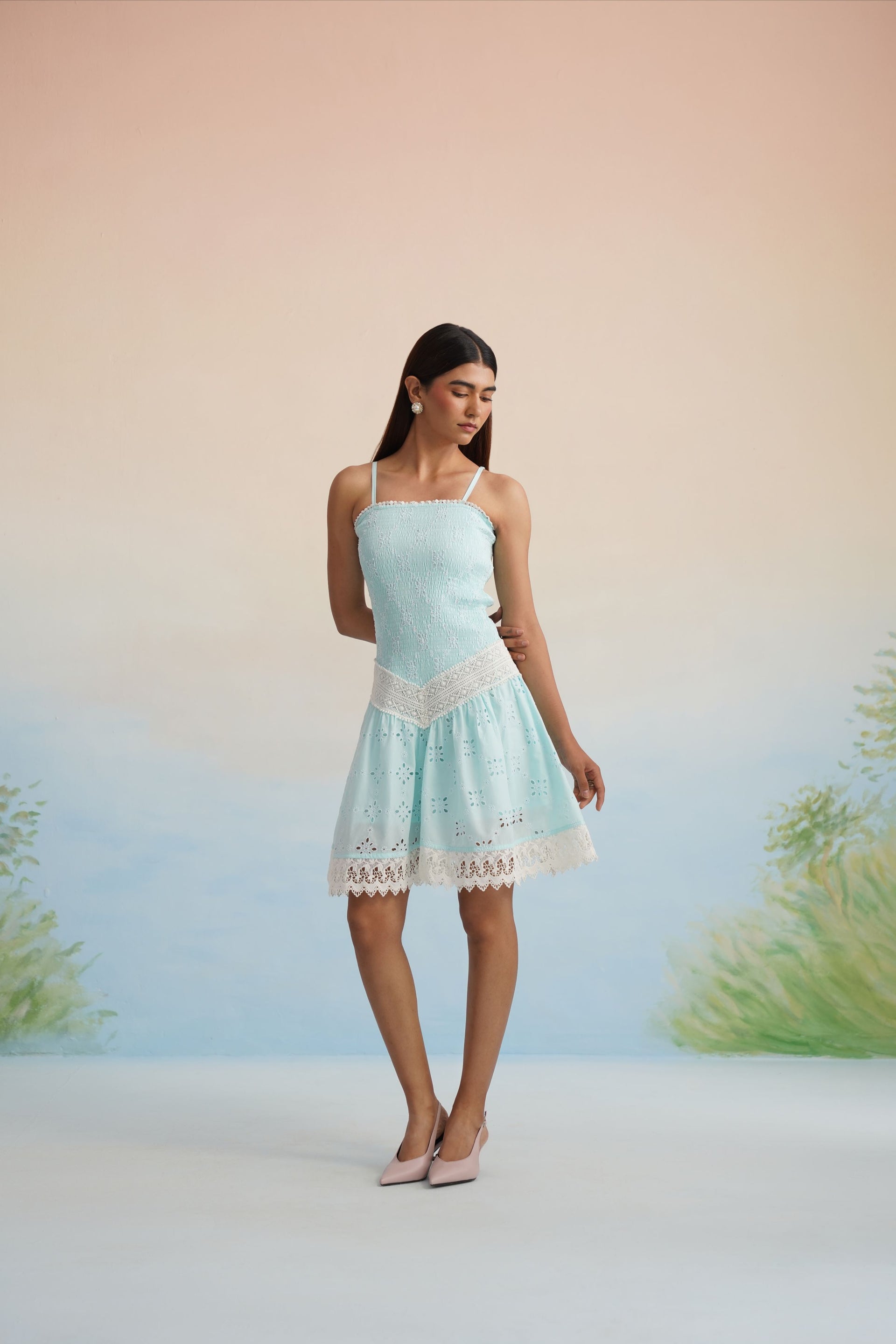 The Aqua Breeze Smocked Eyelet Mini Dress