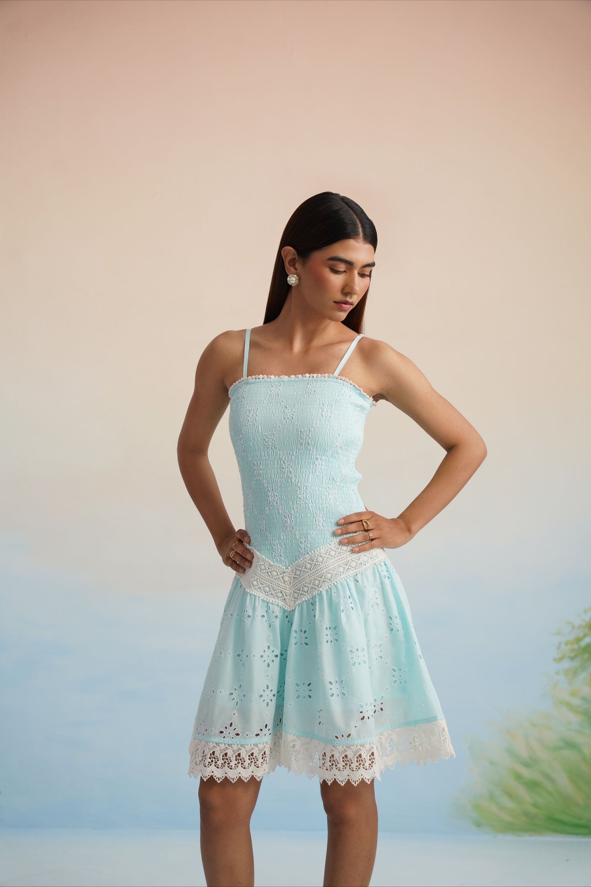 The Aqua Breeze Smocked Eyelet Mini Dress