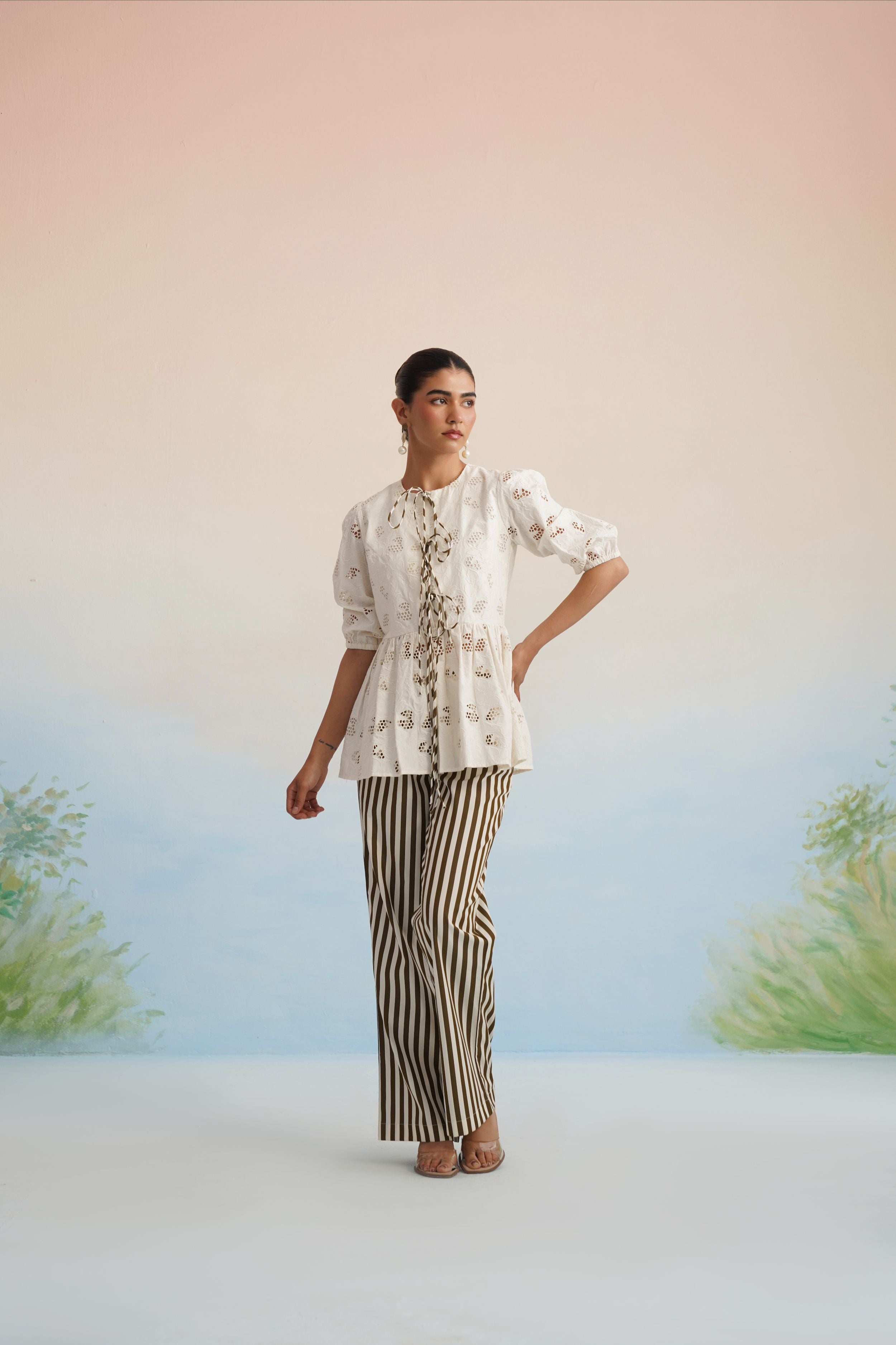 The Alora Broderie Peplum Blouse