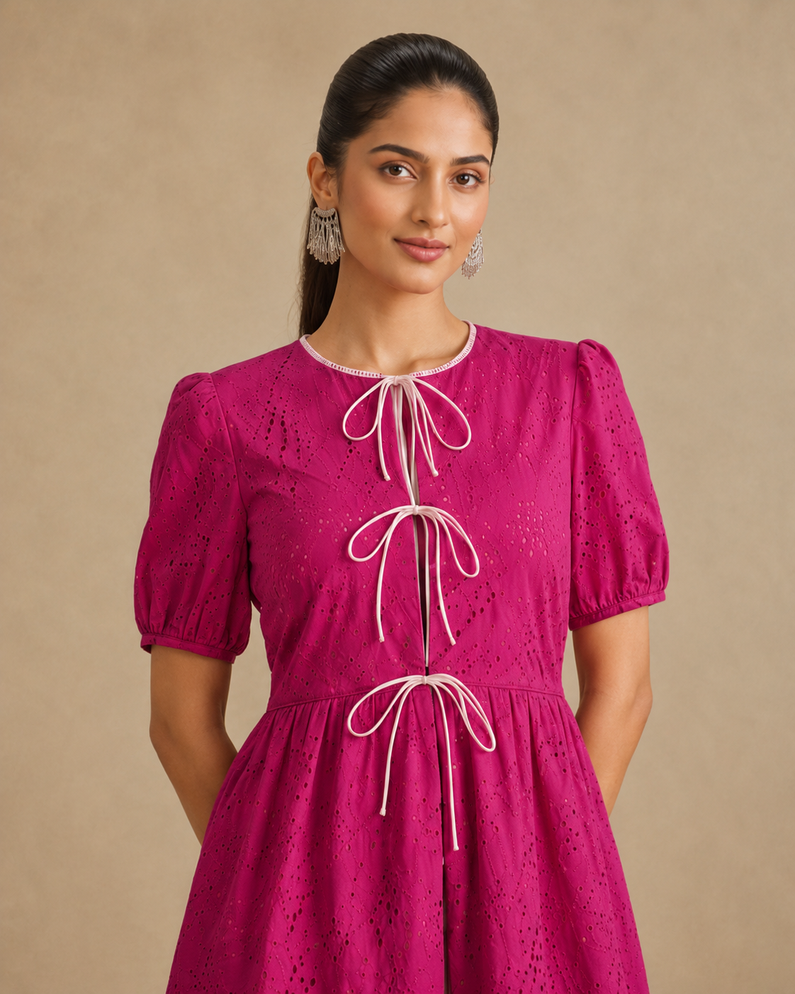 Jaskirat Kaur in The Valencia Fuchsia Eyelet Mini Dress