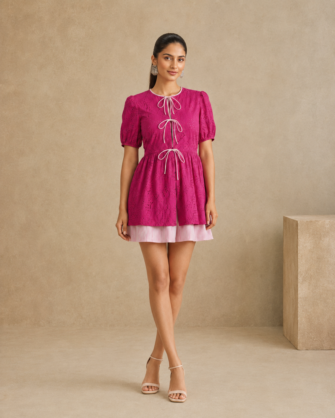 Jaskirat Kaur in The Valencia Fuchsia Eyelet Mini Dress
